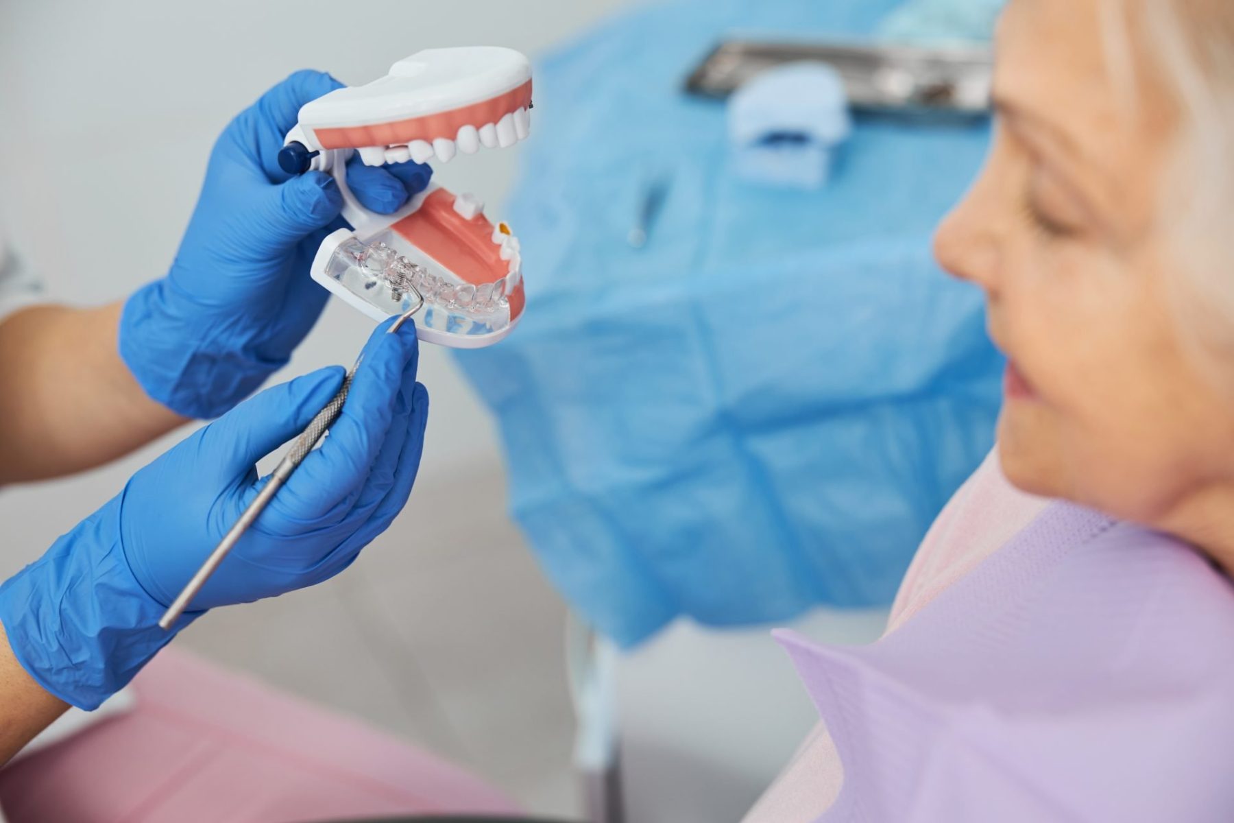 dental-explorer-attracting-attention-to-implant-in-2023-11-27-05-30-35-utc