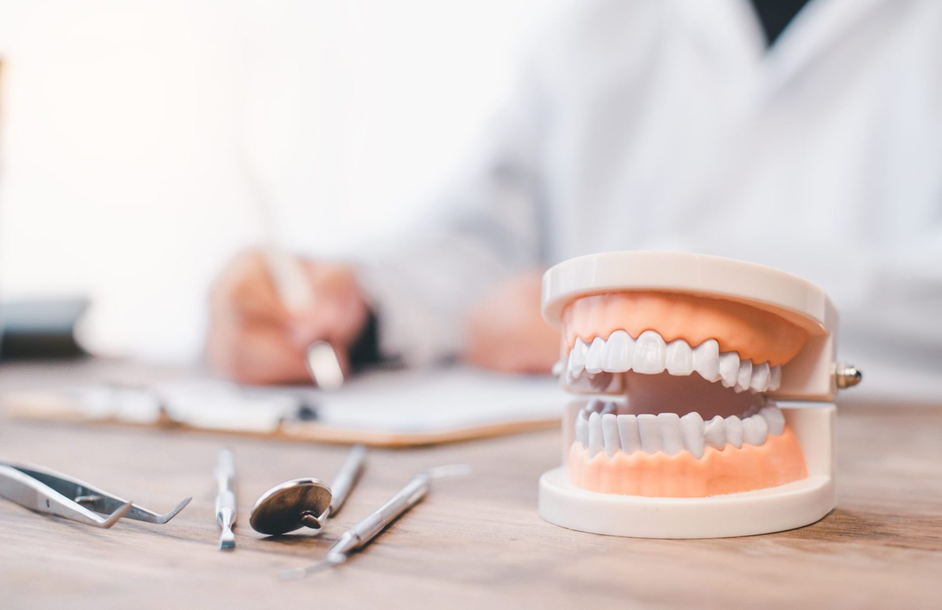 denture-paste-with-dentist-tools-placed-on-the-tab-2023-11-27-05-01-00-utc